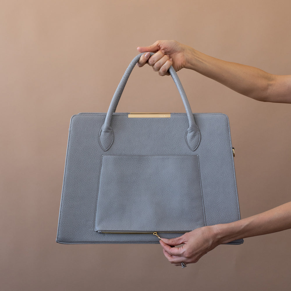 Grey work bag with trolley slot